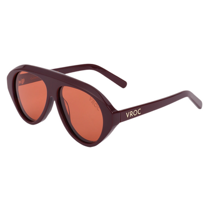 Lunettes de soleil bordeaux profond aux reflets intenses de la marque VROC vu de profile. 