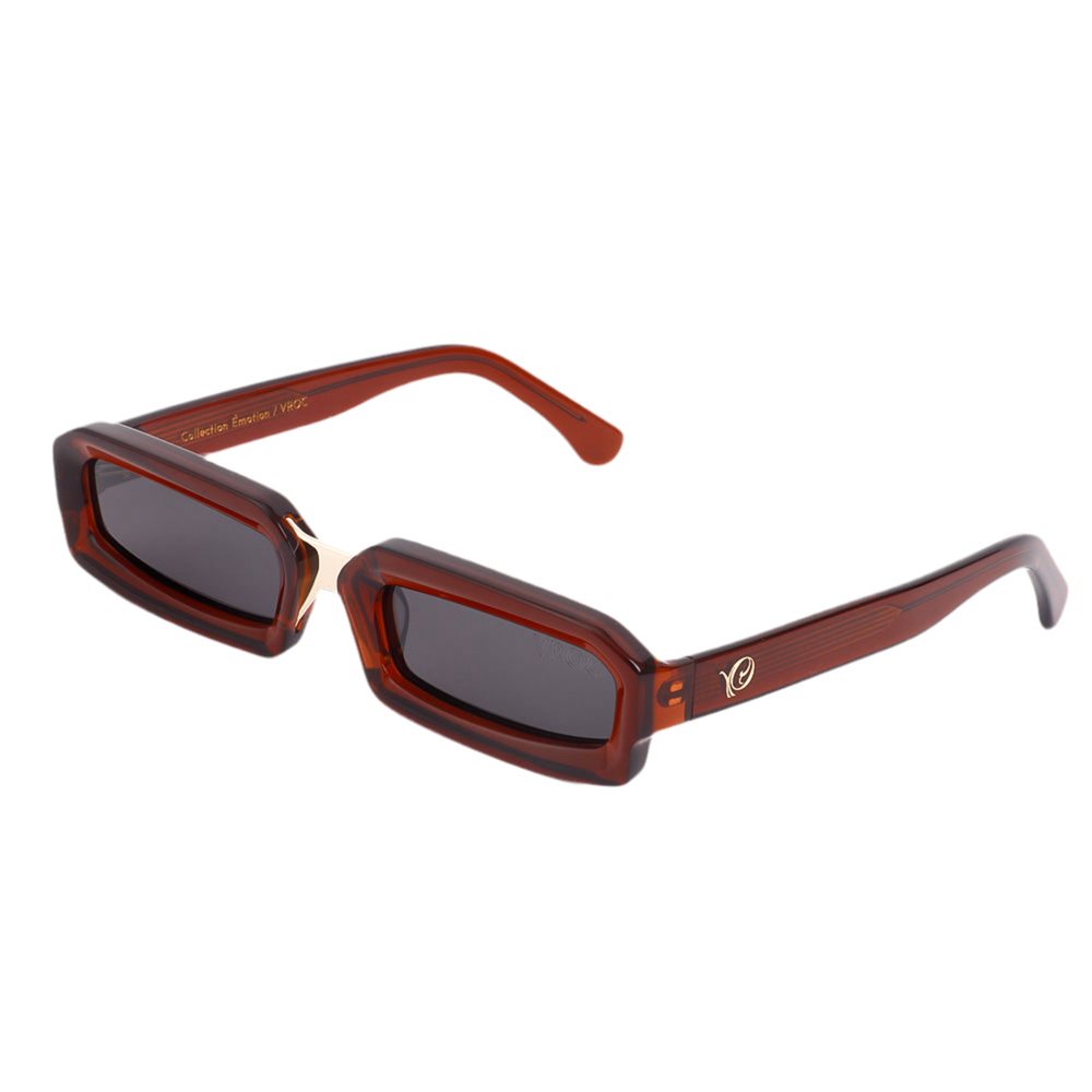 photo de profile des Lunettes de soleil translucides aux teintes ambrées et chaleureuses de la marque VROC. 